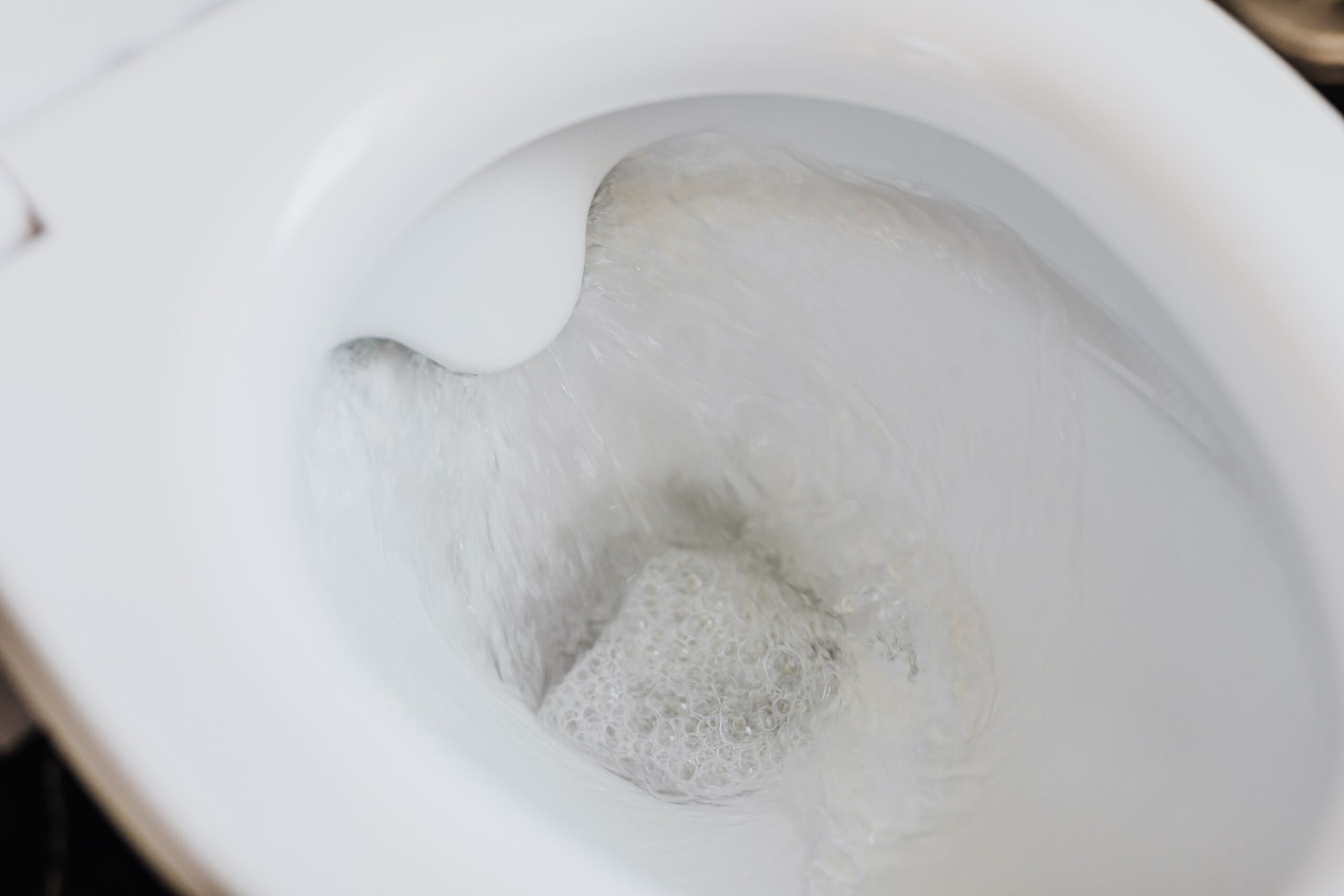 Can I flush the toilet when my water softener is regenerating?